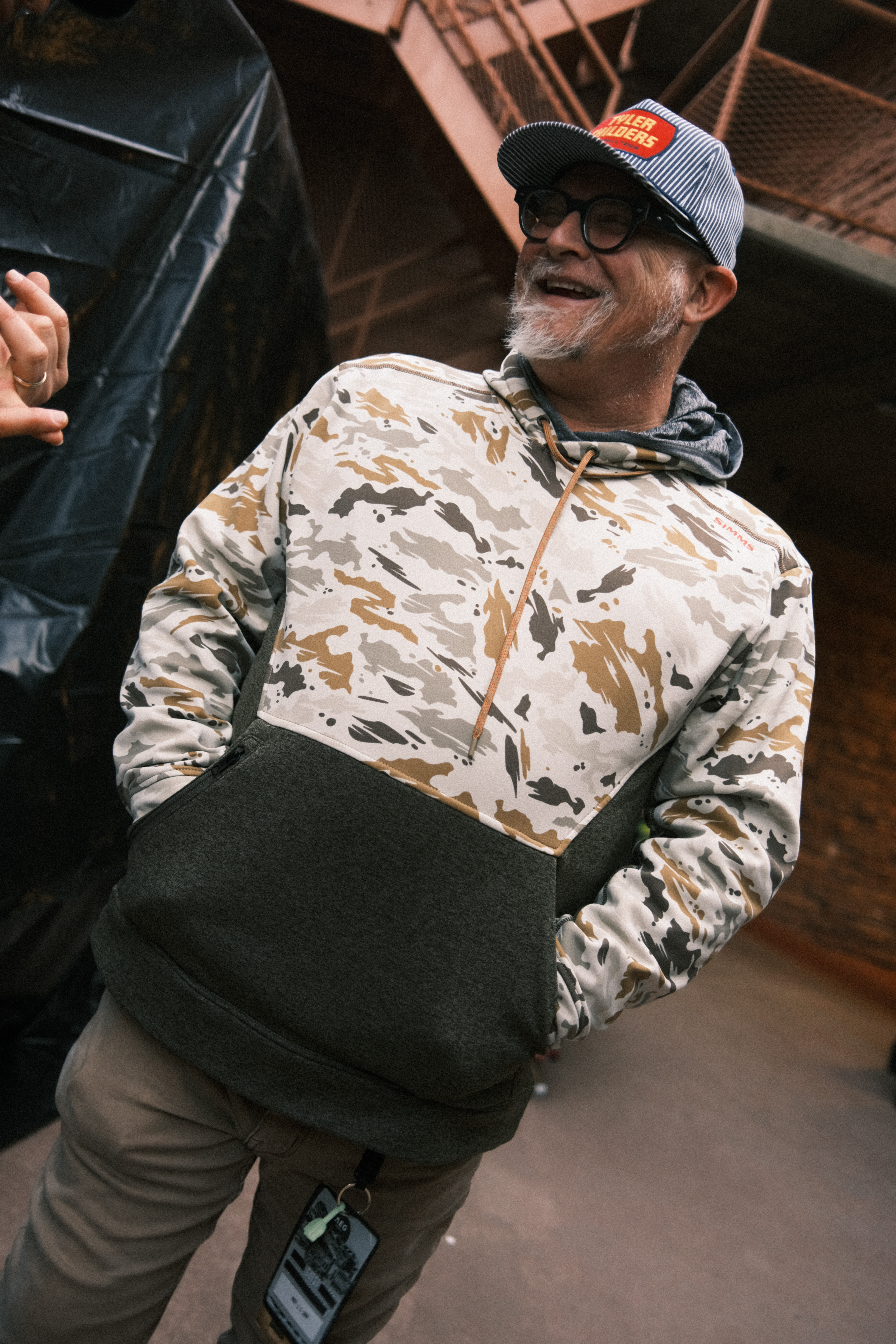 Portrait of Vincent Adam Paul in a camouflage hoodie and cap